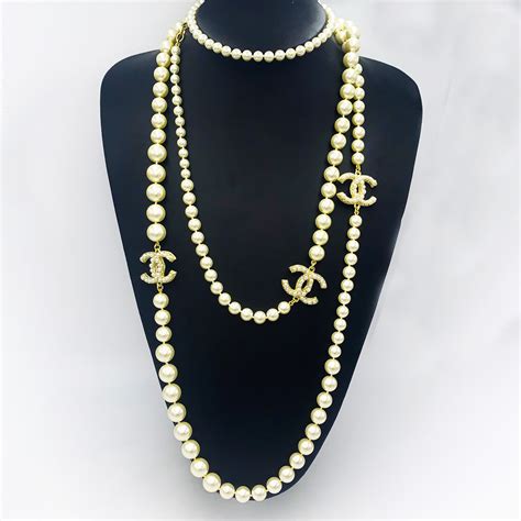 chanel necklace with pearls and logo|Chanel pearl necklace retail price.